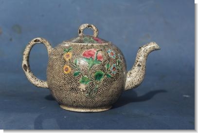 STAFFORDSHIRE WHITE SALTGLAZE TEAPOT.