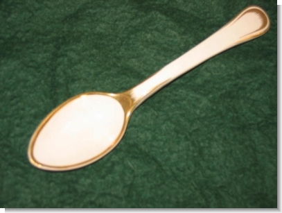 RARE CREAMWARE SPOON, GILT FEATHER EDGE.