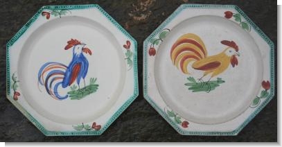 TWO FRENCH CREAMWARE COCKErREL PLATES. c.1790