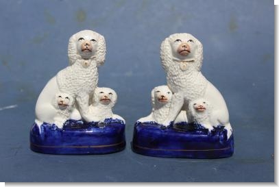 PAIR of SMALL STAFFORDSHIRE DOG GROUPS .1880