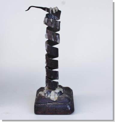 RARE SQUARE BASE IRON TWIST CANDLESTICK.