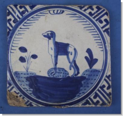 GOOD 17th Century DUTCH DELFT TILE of a DOG, c.1640.