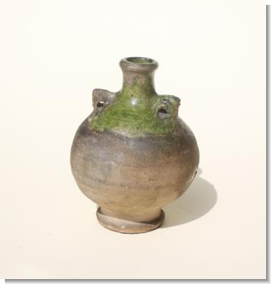 LATE TUDOR GREEN GLAZE COSTREL