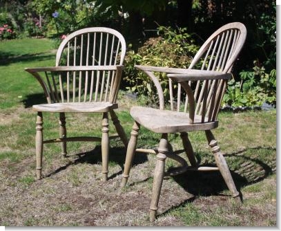 PAIR of WEATHERD WINDSOER CHAIRS