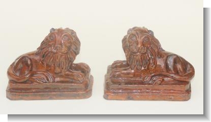 PAIR OF PILL POTTERY LIONS, SWANSEA c.1860