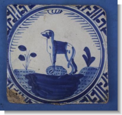 GOOD 17th Century DUTCH DELFT TILE of a DOG, c.1640.