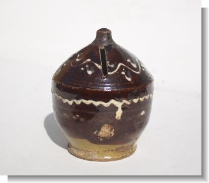 WILTSHIRE SLIPWARE MONEY BOX.