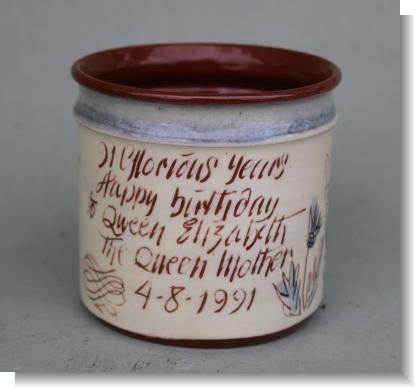 MARY WONDRAUSCH OBE (BRITISH, 1923-2016), A pottery slipware mug